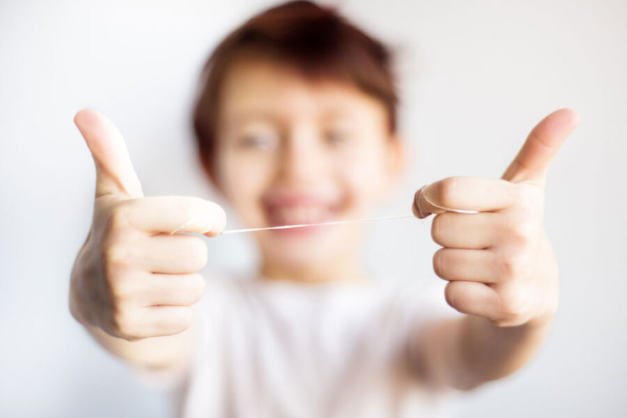 7 Simple Ways to Help Kids Establish a Flossing Habit - Kids Mile High